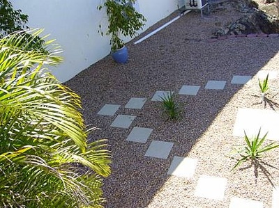 Gravel and step stones in yard Northern Land Design