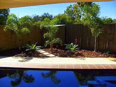 Landscaped yard and pool Northern Land Design
