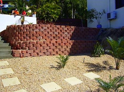 Red bricked retaining wall Northern Land Design