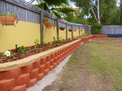 Red bricked landscaped garden Northern Land Design