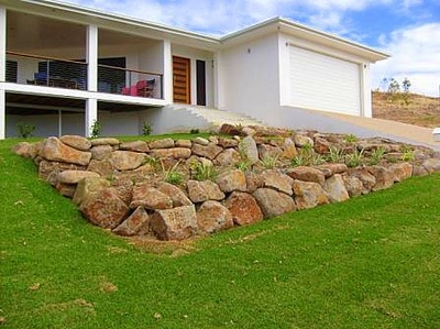 Rock retaining wall Northern Land Design